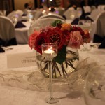 photo of table centerpiece containing roses